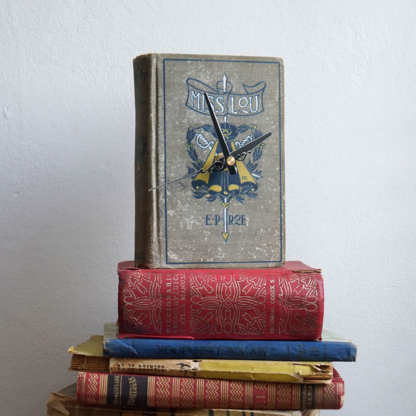 Once A Book: An Eco-Friendly Green Business Dedicated To Sustainably Recycle Old & Used Books Into Novel Home Goods | Hundreds of Millions of Books Are Discarded Ever Year in the US. Help Us Save A Book! Buy Old & Used Books Turned Into Vintage Book Clocks! | What to do with old books?  Where do I donate used books?  How can I recycle hardcover textbooks?  Why not make a handmade Vintage Book Clock!?